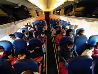 Photos: Indian expats in UAE board first flights to home country since coronavirus crisis
