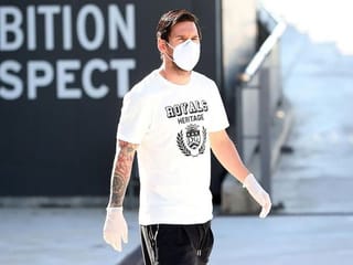 In pictures: Messi marches in as footballers return to action across globe