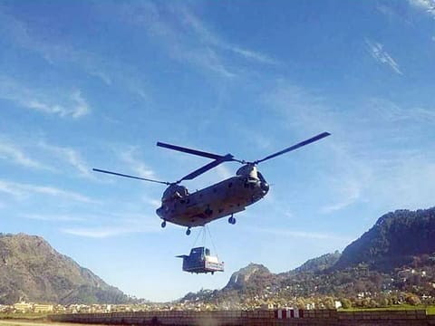 A Chinook helicopter carries equipments to Gunji as Border Roads Organisation connected Kailash Mansarovar route to Lipulekh pass at a height of 17,060 ft, providing connectivity to border villages & security forces, on Friday. 