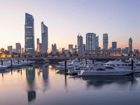 Kuwait's investors are staying put this summer, and they are keeping busy by getting into domestic real estate opportunities. Their Gulf counterparts are doing the same.
