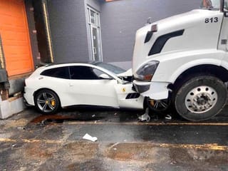 Angry trucker drives over boss’s Ferrari