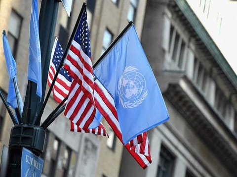 Flags of the United Nations and the United States of America are seen in New York City.
