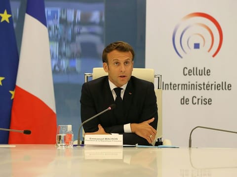 French president Emmanuel Macron takes part in a videoconference with region prefects at the crisis center of the interior ministry, on May 13, 2020 in Paris. 