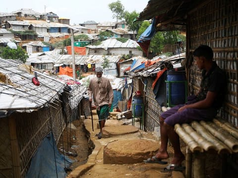A Rohingya refugee walks at a refugee camp in Cox's Bazar, Bangladesh, March 7, 2019. 