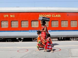 In pictures: Indian migrant workers homecoming still a long way off 