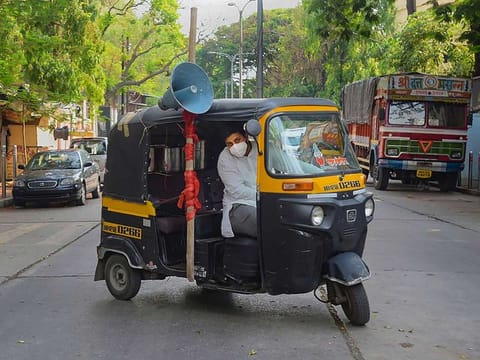Akshay Kothawale, an auto-rickshaw driver, uses the money saved for his marriage ceremony to feed the needy during the ongoing COVID-19 nationwide lockdown, in Pune, Monday, May 18, 2020. 