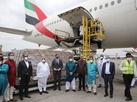 The PPE gowns being loaded on a flight 