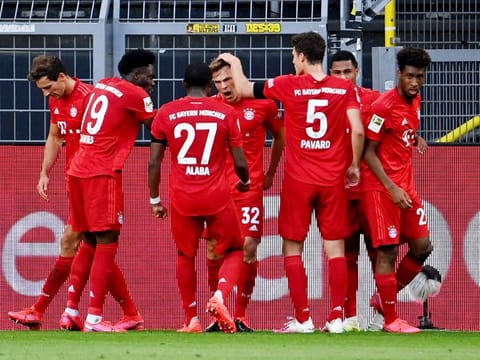 Bayern Munich's Joshua Kimmich celebrates scoring the only goal of the game against Borussia Dortmund