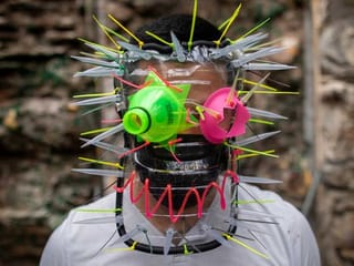 Filipino artist creates artistic face masks to raise COVID-19 awareness