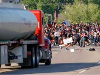Truck drives into protesters on Minneapolis highway