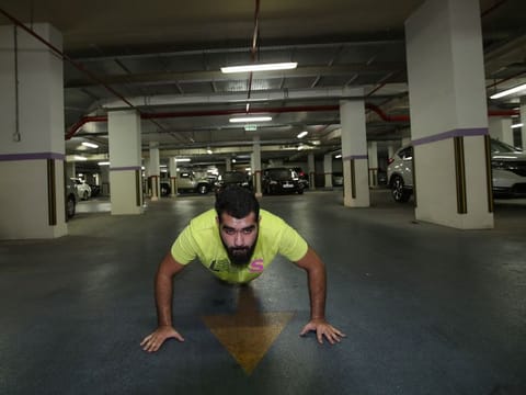 Local Bahraini Mixed Marcial Arts (MMA) fighter, Dawood Javed, trains for MMA Championship at his building's basement car-park, following the outbreak of the coronavirus disease (COVID-19), in Manama, Bahrain, May 17, 2020. 