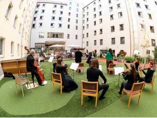 Opera returns to Vienna with hotel 'window concert'