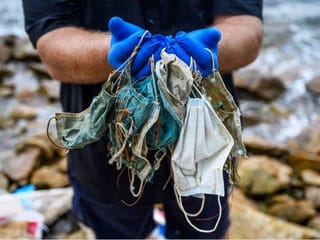 COVID-19: Anti-virus face masks litter Hong Kong's beaches