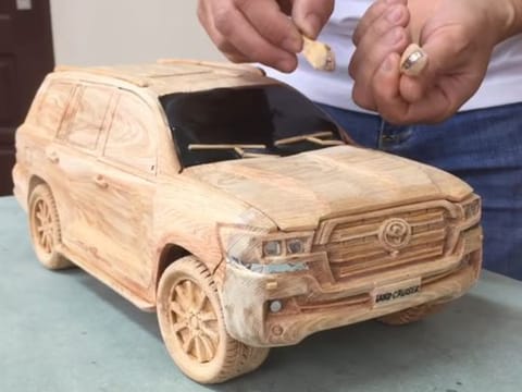 Incredible wood art! Toyota Land Cruiser carved out of blocks