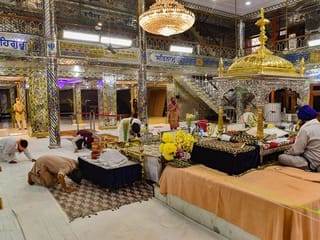 In Pictures: Places of worship reopen in India with caution being the key