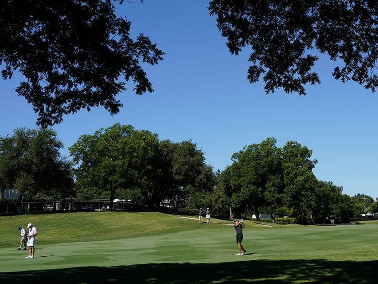 Jordan Spieth hits from the 15th fairway during practice for the Charles Schwab Challenge golf tournament at the Colonial Country Club in Fort Worth, Texas, Wednesday, June 10, 2020. (AP Photo/David J. Phillip)
