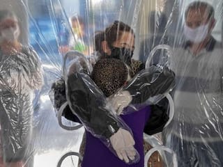 Brazilian retirement home offers 'hugging curtain' amid COVID-19 pandemic