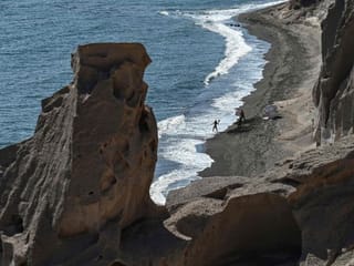 Photos: Fear and impatience as Greek island of Santorini awaits return of mass tourism