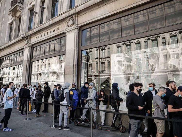 People queue shop London