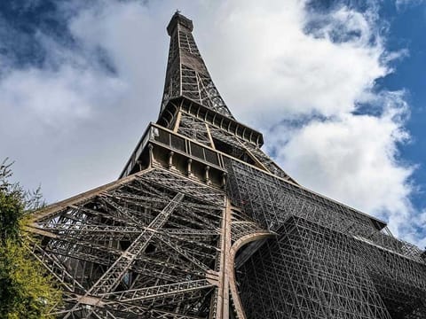 Picture of the Eiffel Tower taken on June 15, 2020 in Paris, as cultural sights begin to open to the public across France following the easing of the lockdown measures taken to curb the spread of the COVID-19 pandemic. 