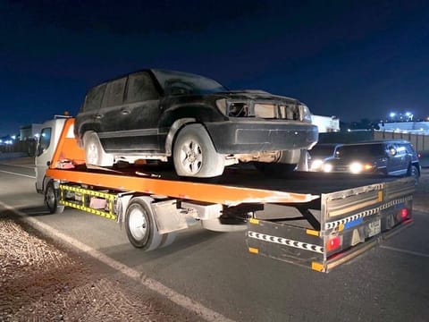The young man's vehicle is taken away.