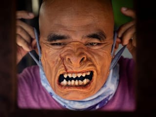 Filipino SFX artist seeks to ward off virus with horror-inspired face masks