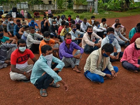Migrant workers from Bihar state wait for buses to catch home bound train in Kochi in a file picture. The top court directed the government to develop the portal in consultation with National Informatics Centre (NIC) for registration of the unorganised labourers/migrant workers.