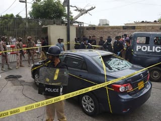 Pictures: Pakistan stock exchange in Karachi attacked by gunmen 