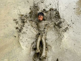 Farmers celebrate National Paddy Day in Nepal as the annual rice planting season begins