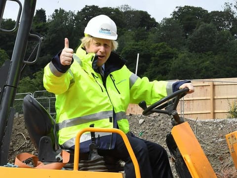 Britain's Prime Minister Boris Johnson visits the Speller Metcalfe's building site at The Dudley Institute of Technology in Dudley, central England on June 30, 2020. Johnson said Britain needed the type of massive economic response that US president Franklin D. Roosevelt mobilised to deal with the Great Depression.