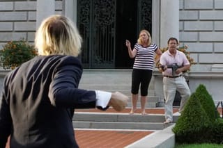 Photos: St. Louis couple threatens protesters with guns outside their home