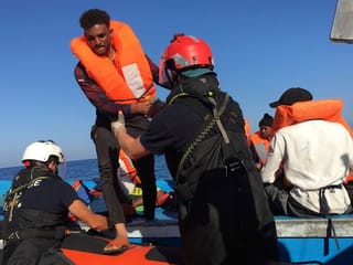 'I'm going to jump': Tensions running high on migrant rescue ship
