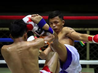 Thai boxing matches resume after lockdown, but audiences stay home