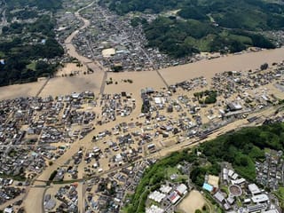 Photos: Heavy rain floods southern Japan, over a dozen presumed dead
