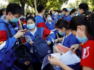 Chinese students take university entrance exam after COVID-19 wait