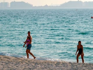 COVID-19: Tourists enjoy the sun and surf in Dubai