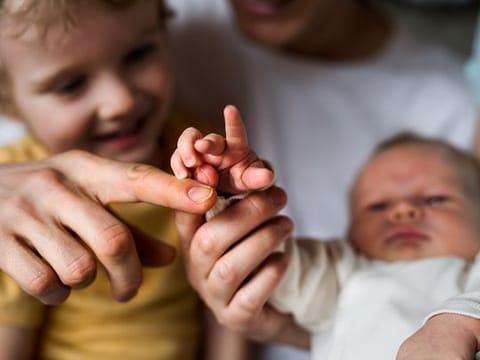 Helping older kids adjust to a new baby
