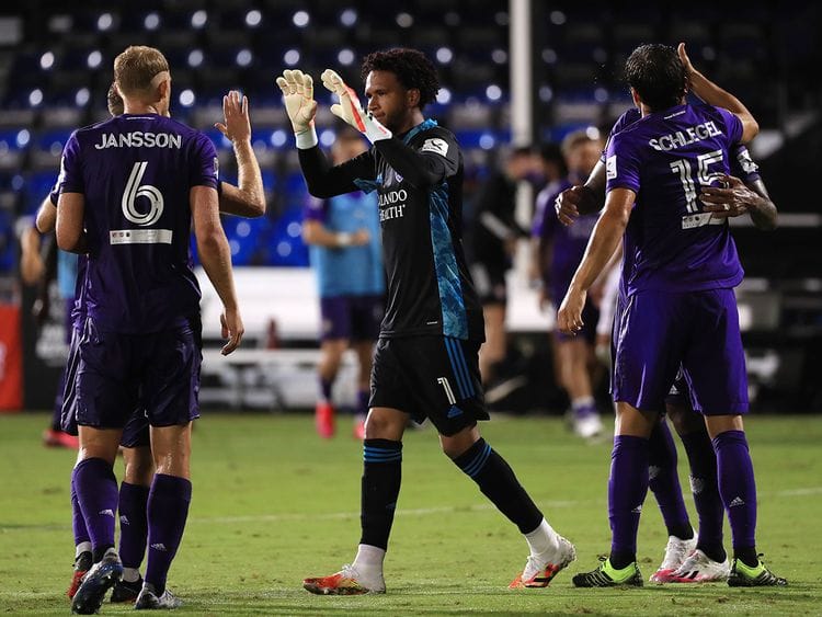 Pedro Gallese of Orlando City greets teammates after their victory over Inter Miami 