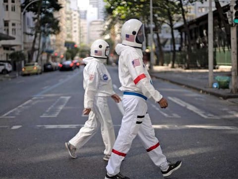 Brazilian couple wear 'spacesuits' to fight COVID-19