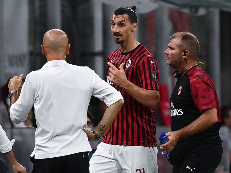AC Milan’s Zlatan Ibrahimovic argues with coach Stefano Pioli after his substitution