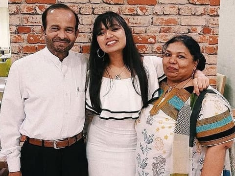 Abdullah Mohammad Ishaq Chougulay with daughter Zareen and his wife Clementine