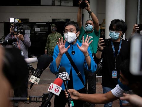 Rappler CEO and Executive Editor Maria Ressa leaves a regional trial court after pleading not guilty to tax evasion charges, in Pasig City, Metro Manila, Philippines.