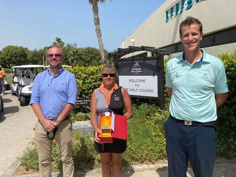 Suzanne Wallace (centre), winner of the inaugural 2020 JA Summer Classic.