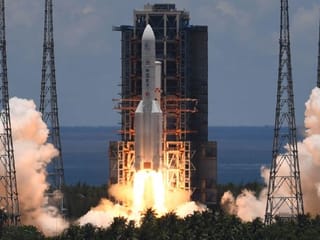 Photos: China launches Mars probe in space race with US