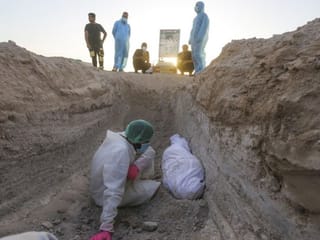 Photos: Lonely burials for COVID-19 victims in Iraq's Najaf