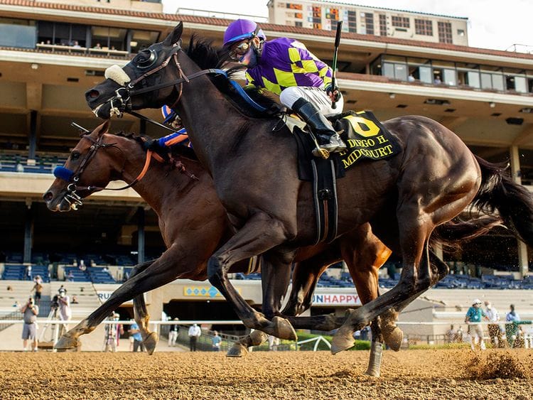 In this image provided by Benoit Photo, Maximum Security, outside, with Abel Cedillo aboard, overpowers Midcourt, inside, with Victor Espinoza aboard, to win the Grade II, $150,000 San Diego Handicap horse race Saturday, July 25, 2020, at Del Mar Thoroughbred Club in Del Mar, Calif. (Benoit Photo via AP)