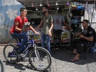 Photos: Gazans get first taste of coffee-to-your-door