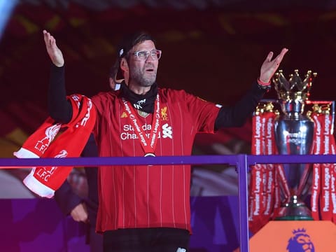 Juergen Klopp, the Liverpool manager, celebrates after winning the Premier League trophy last week.