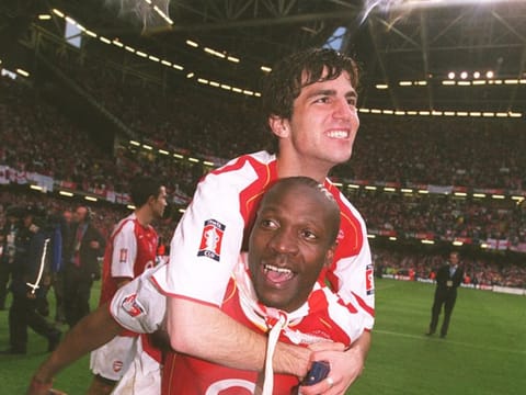 Cesc Fabregas and Lauren celebrate the FA Cup final win over Manchester United in 2005 Cardiff, Wales
