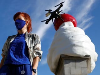 Photos: Ominous whipped cream art comes to London's Trafalgar Square